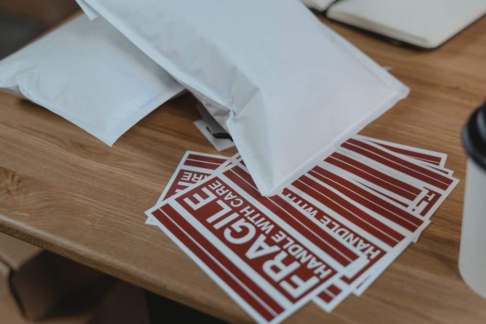 White poly mailers with fragile labels